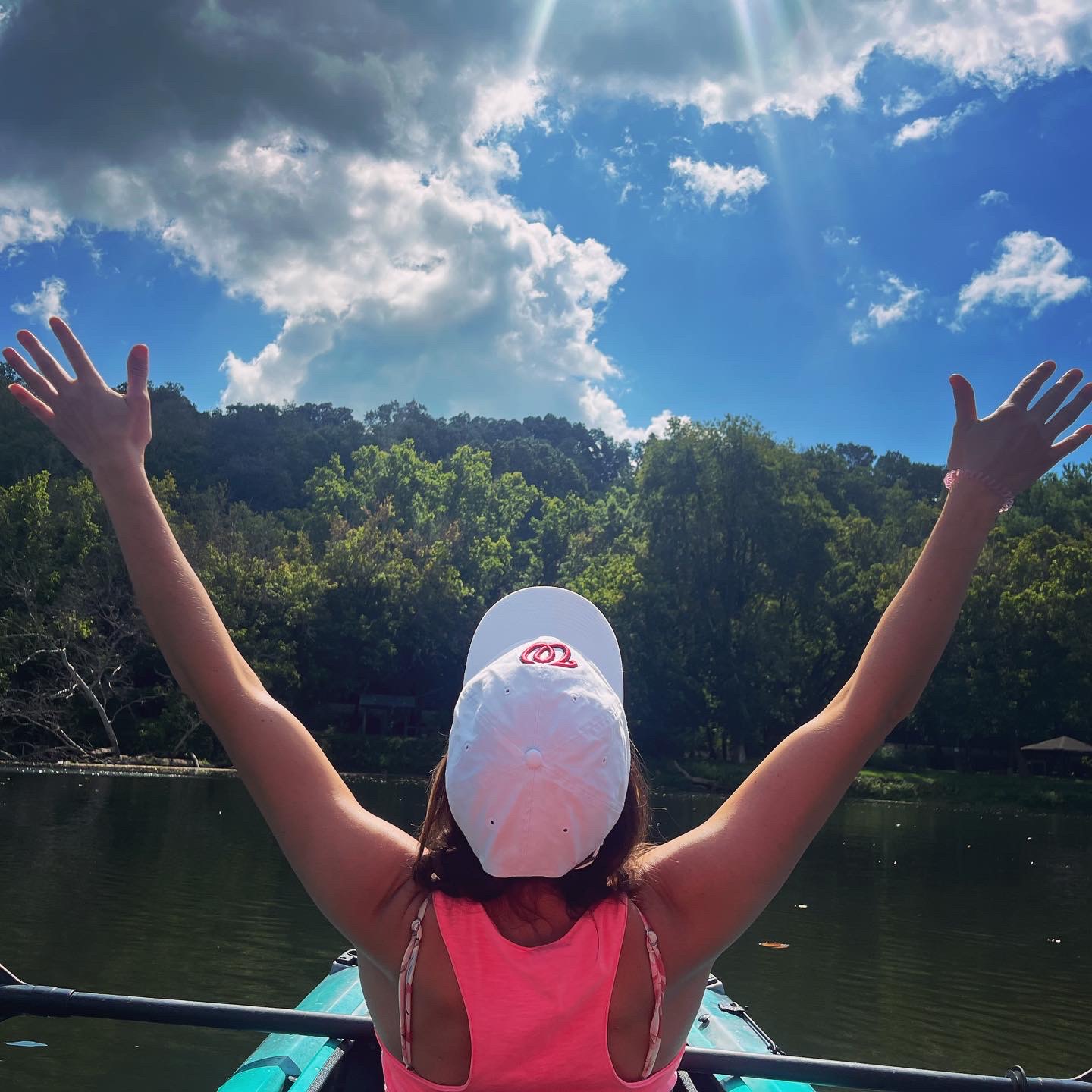 Kayaking reaching to sky